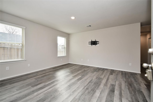 empty room featuring dark hardwood / wood-style floors