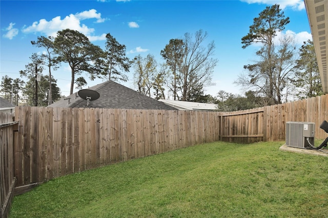 view of yard with central AC