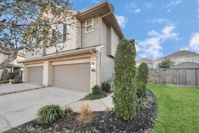 view of home's exterior with a garage