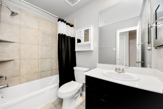 full bathroom with tile patterned flooring, shower / bath combo, vanity, and toilet