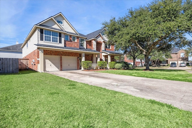 view of front of house featuring a front yard and a garage