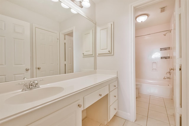 full bathroom with bathing tub / shower combination, vanity, tile patterned floors, and toilet