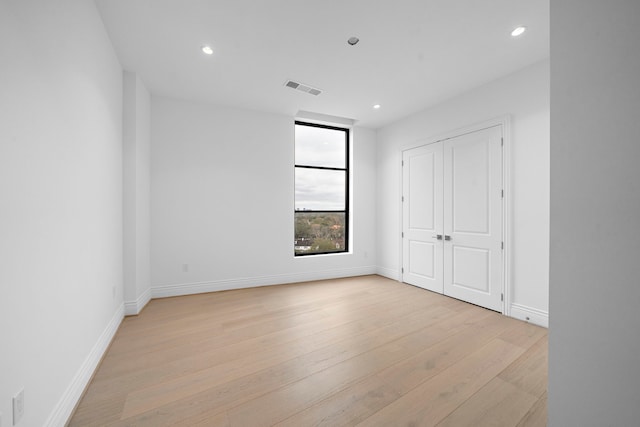 2323 San Felipe St Unit 803, Houston, TX 77019 - unfurnished room with light hardwood / wood-style floors