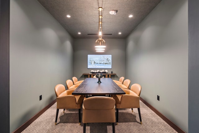 view of carpeted dining space