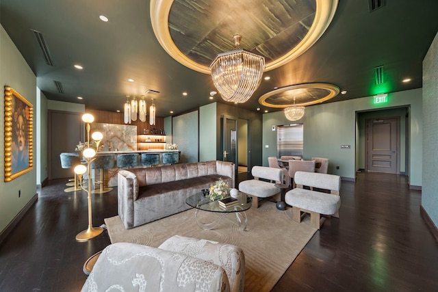 2323 San Felipe St Unit 803, Houston, TX 77019 - living room with a notable chandelier, dark hardwood / wood-style flooring, and a tray ceiling