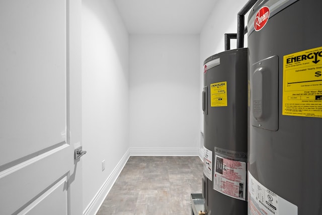 2323 San Felipe St Unit 803, Houston, TX 77019 - utility room featuring electric water heater