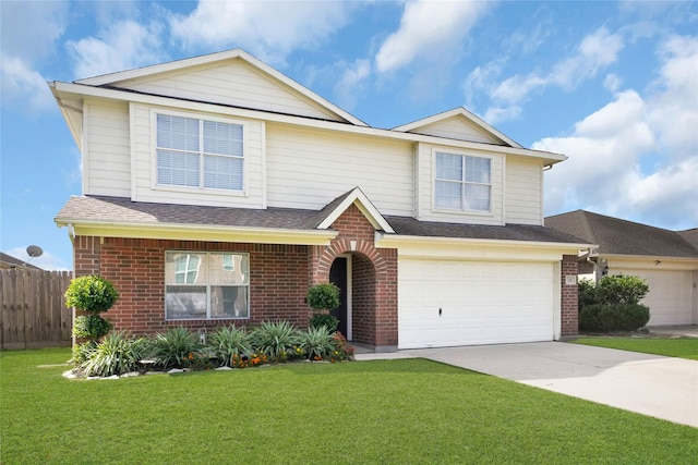 view of front facade featuring a front yard and a garage