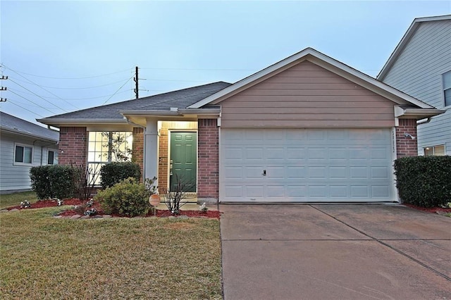 ranch-style home with a garage and a front yard