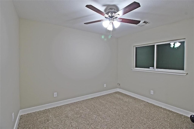 unfurnished room featuring carpet and ceiling fan