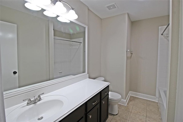 full bathroom featuring tile patterned flooring, vanity, toilet, and tiled shower / bath