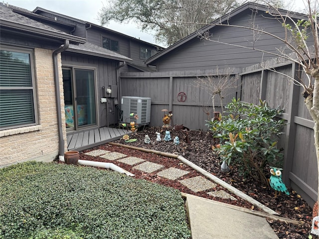 view of yard featuring central AC