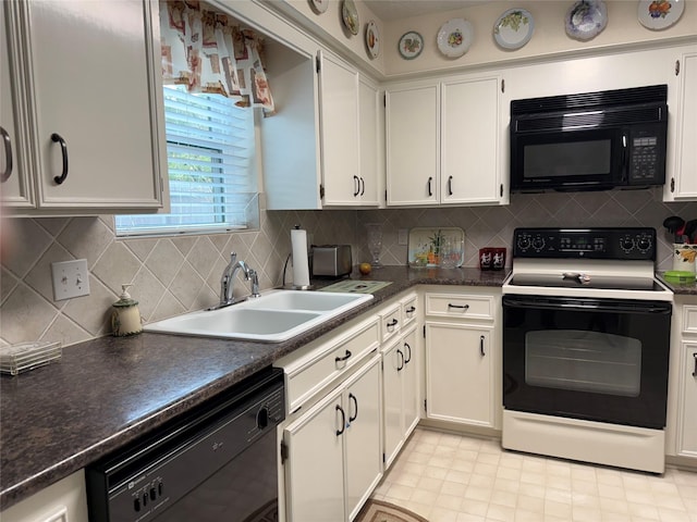 kitchen featuring tasteful backsplash, sink, white cabinets, and black appliances