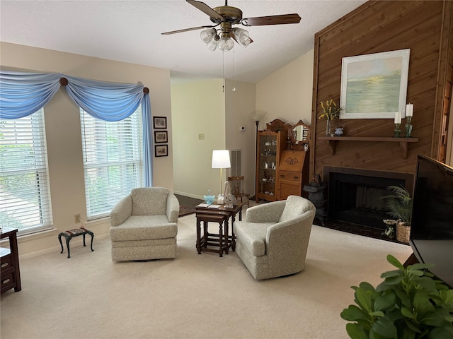 living room with carpet, plenty of natural light, and ceiling fan