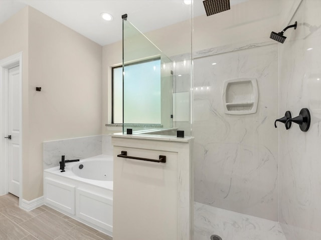 bathroom with plus walk in shower and tile patterned floors