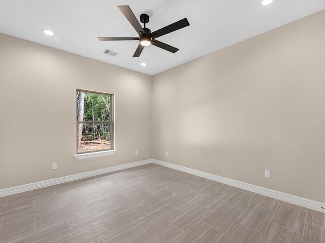 empty room featuring ceiling fan