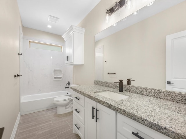 full bathroom featuring vanity, toilet, and tub / shower combination