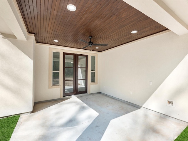 view of patio with french doors and ceiling fan