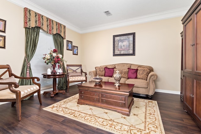 living room featuring dark wood-type flooring and ornamental molding