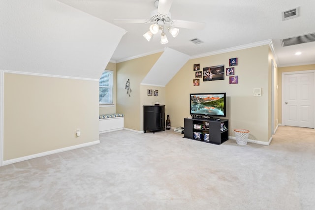 interior space featuring light carpet, ceiling fan, and crown molding