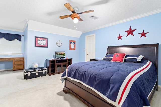 bedroom featuring a textured ceiling, ceiling fan, and crown molding