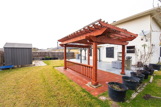 view of yard featuring a pergola, a patio area, and a storage shed