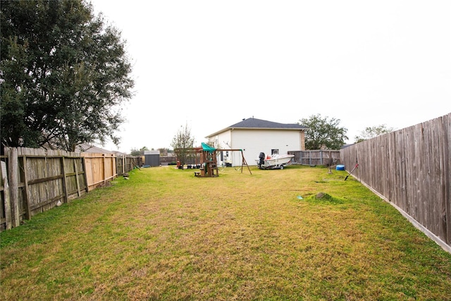 view of yard with a playground