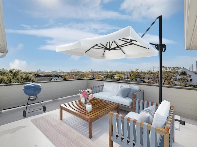 view of patio with a balcony and outdoor lounge area