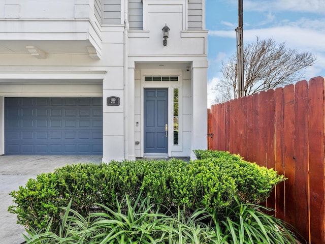 entrance to property featuring a garage