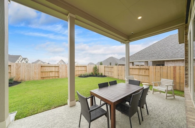 view of patio / terrace with a fenced backyard and outdoor dining area