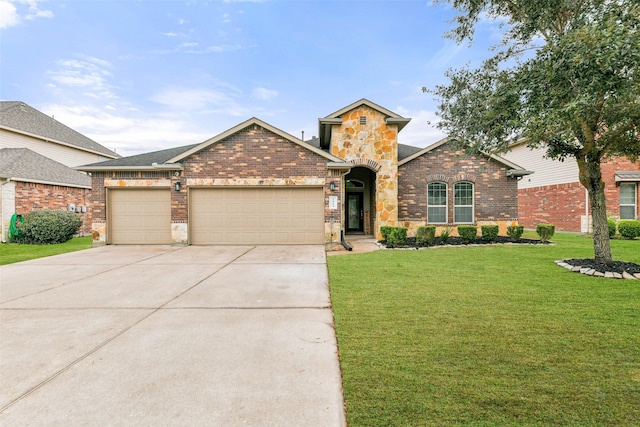 front of property featuring a garage and a front lawn