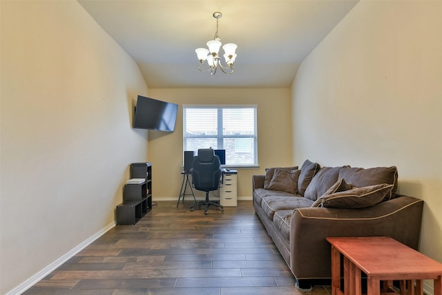 living room with a notable chandelier, dark hardwood / wood-style floors, and lofted ceiling