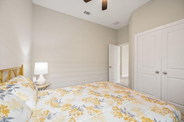 bedroom with carpet, a closet, and ceiling fan