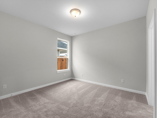 unfurnished room with carpet