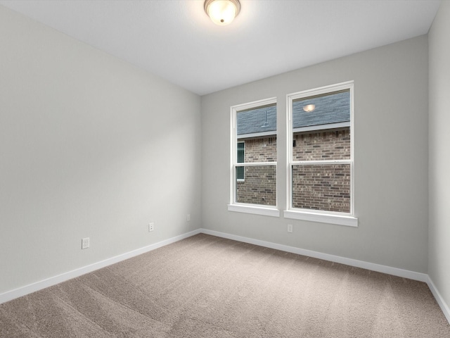 view of carpeted spare room