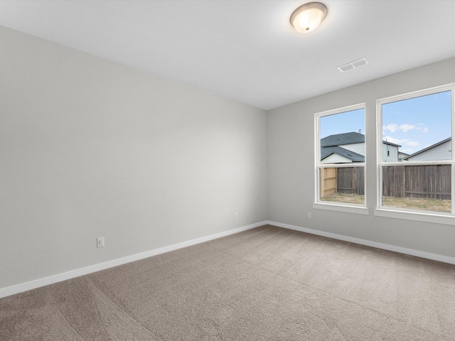 view of carpeted spare room