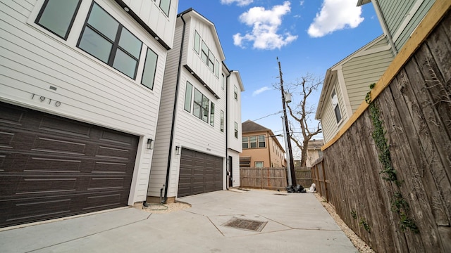 view of property exterior with a garage