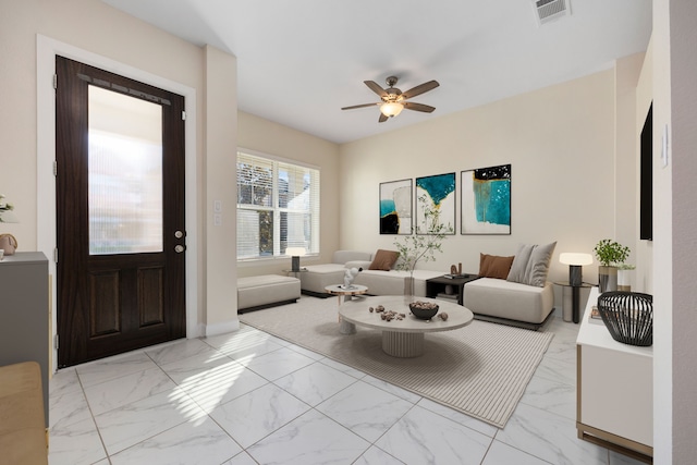 living room with ceiling fan