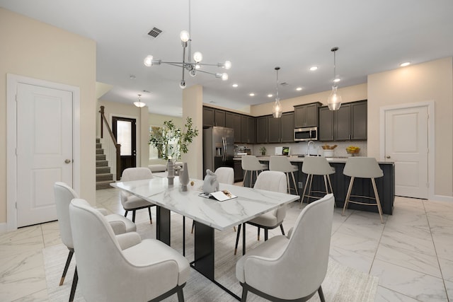 dining space featuring sink