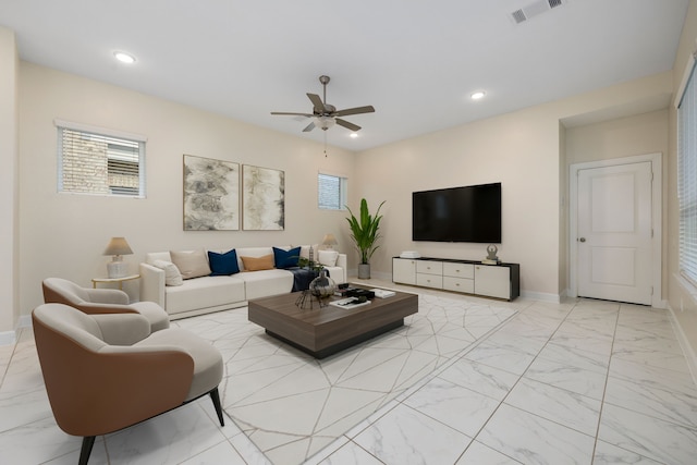 living room with ceiling fan