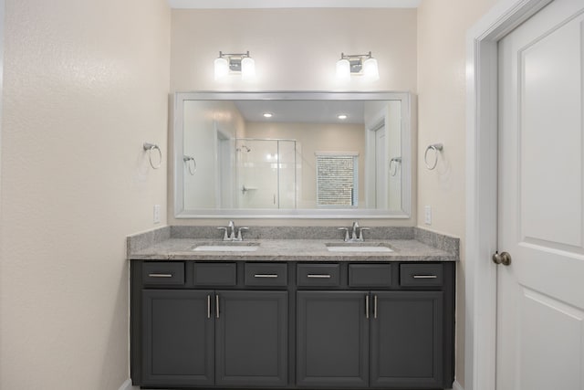 bathroom with vanity and walk in shower