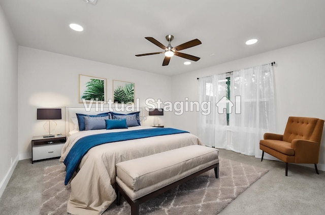 carpeted bedroom featuring ceiling fan