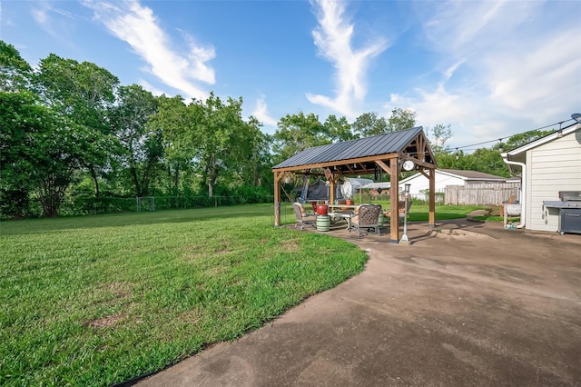 view of yard with a gazebo and a patio area