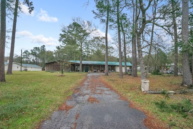 ranch-style house with a front lawn