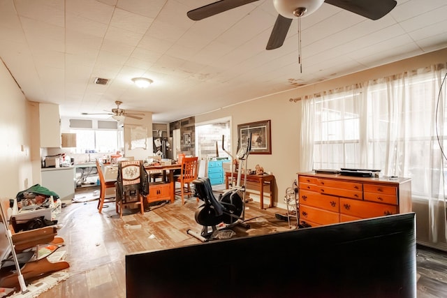 interior space with hardwood / wood-style floors and a healthy amount of sunlight