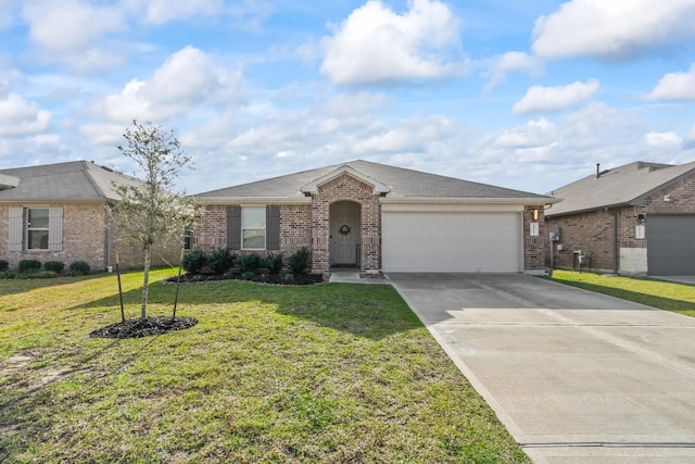 ranch-style house featuring a front yard and a garage