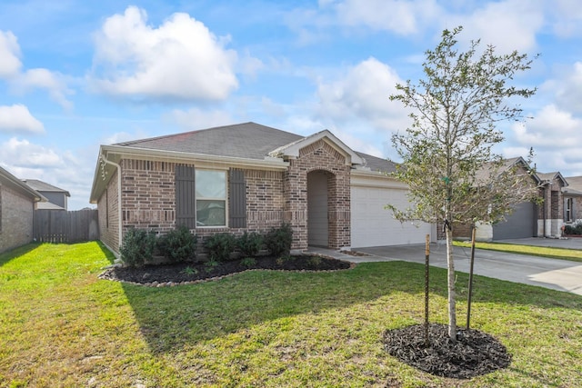 ranch-style house with a front yard, an attached garage, brick siding, and driveway