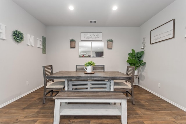 dining room featuring recessed lighting, wood finished floors, and baseboards