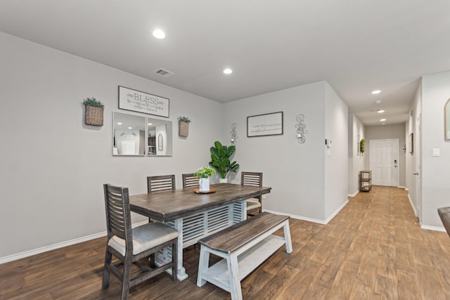 dining space featuring visible vents, recessed lighting, baseboards, and wood finished floors