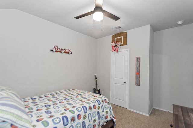 bedroom featuring light carpet, visible vents, baseboards, and ceiling fan