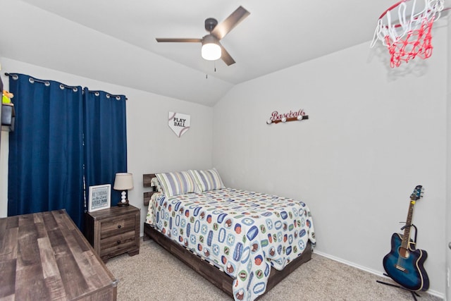 bedroom featuring baseboards, lofted ceiling, carpet floors, and ceiling fan